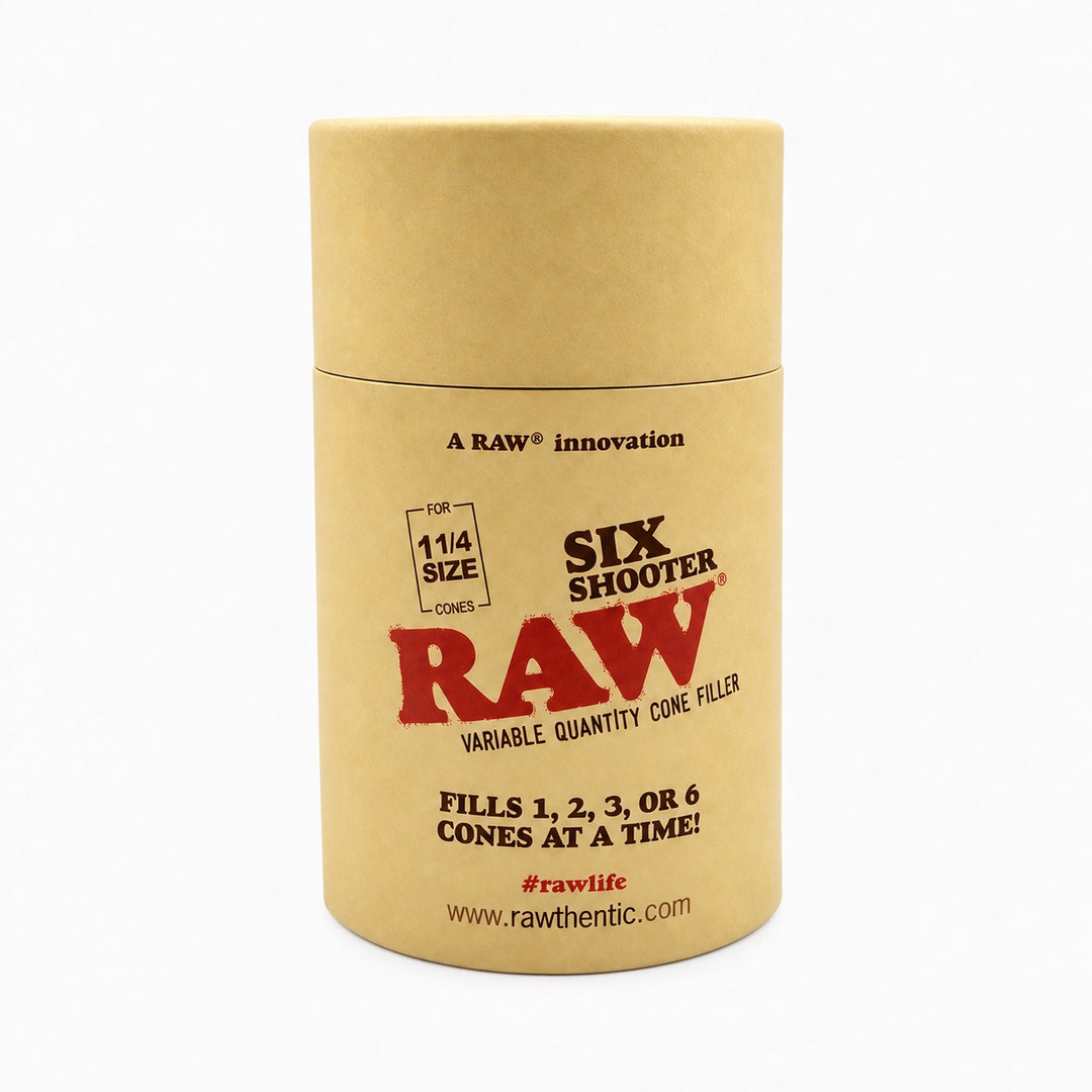 Tubo cilíndrico de cartón kraft en el que viene el RAW Six Shooter para conos de tamaño 1 1/4
