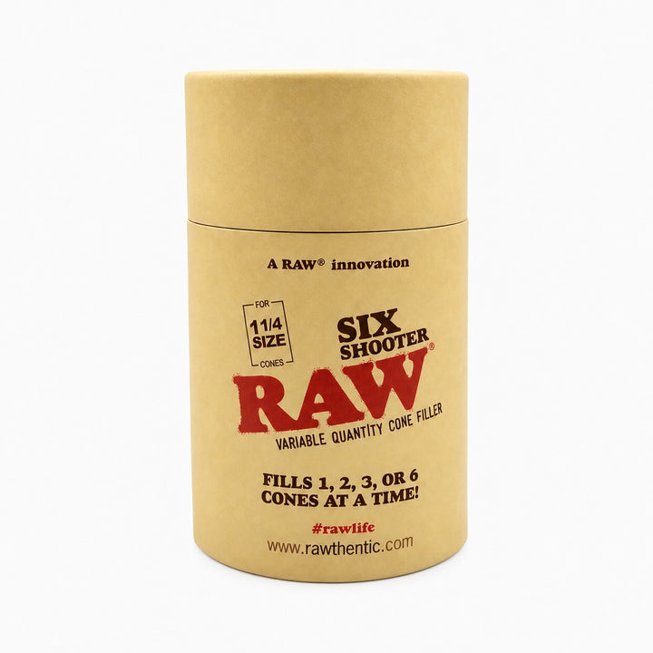 Tubo cilíndrico de cartón kraft en el que viene el RAW Six Shooter para conos de tamaño 1 1/4
