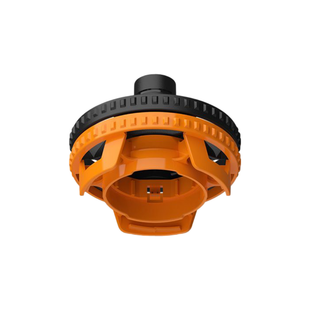 Detalle del encaje entre tapa negra y base naranja — sistema clip OEM Storz &amp; Bickel