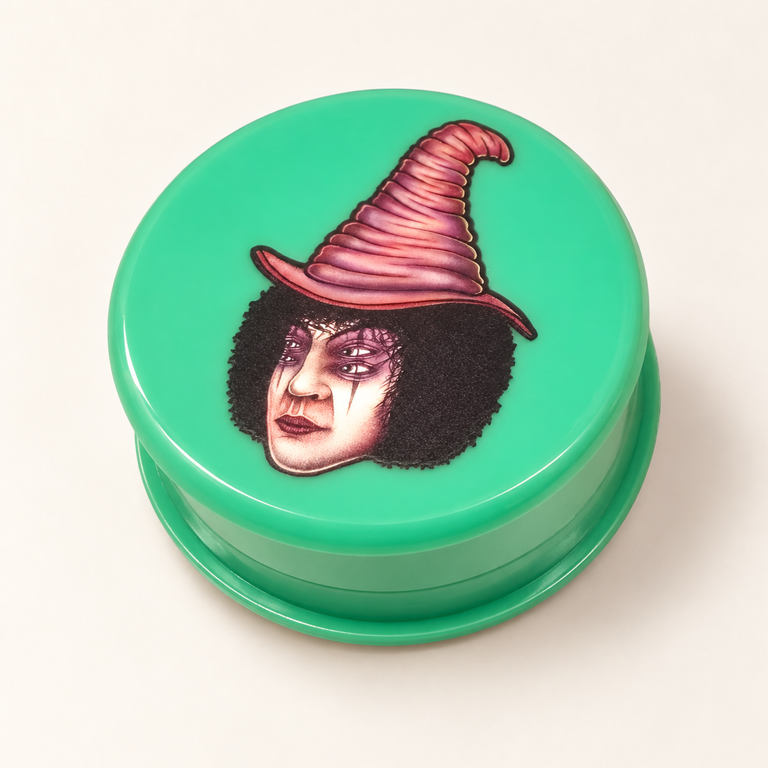 Tapa verde del grinder Lion Rolling Circus con personaje de sombrero puntiagudo