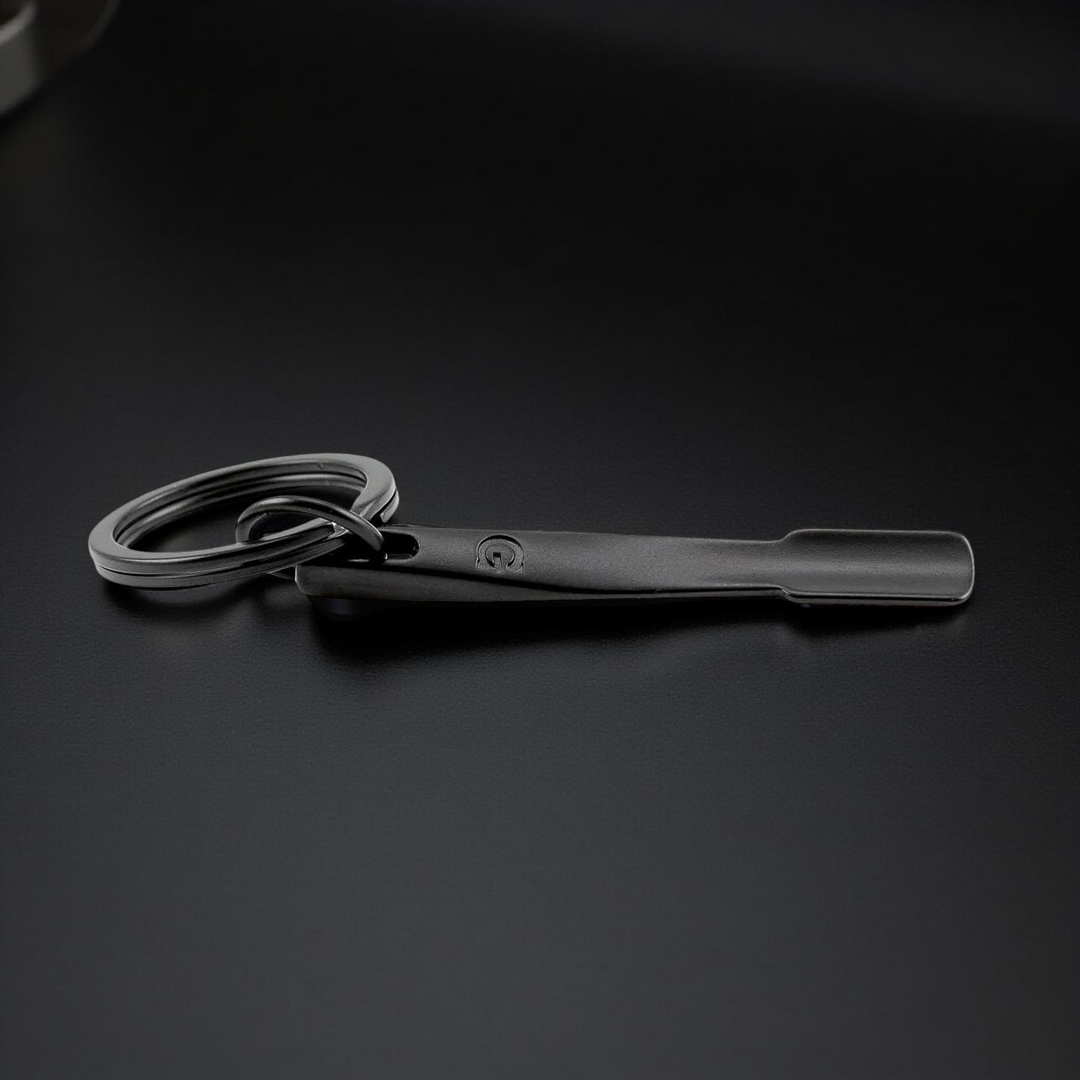 Herramienta keychain original del G Pen Dash+ para limpieza y mantenimiento.