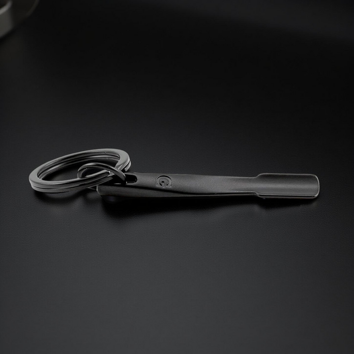 Herramienta keychain original del G Pen Dash+ para limpieza y mantenimiento.