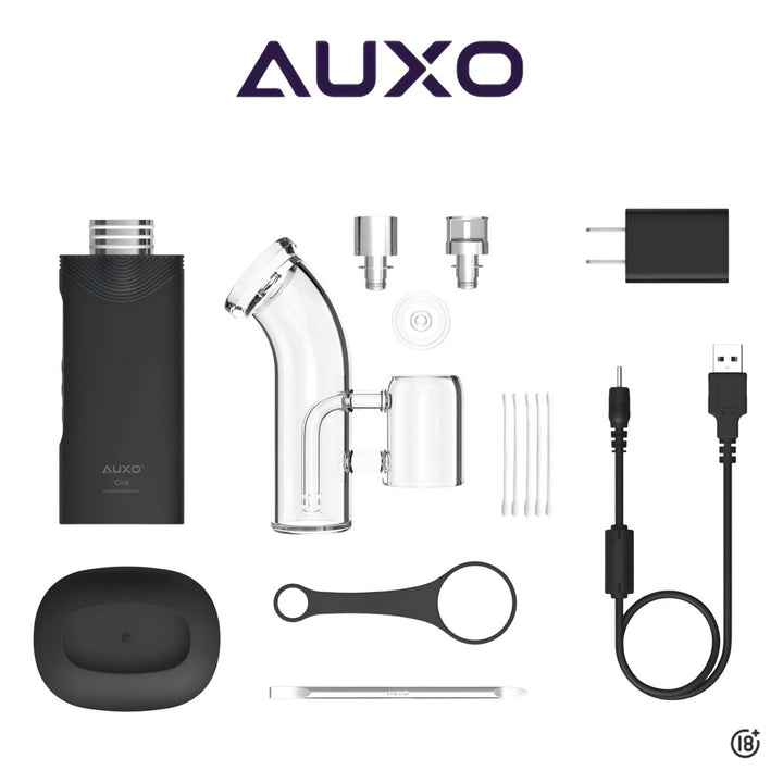 Kit completo del vaporizador Auxo Cira con accesorios incluidos: cargador, cables, boquilla de vidrio y herramientas.