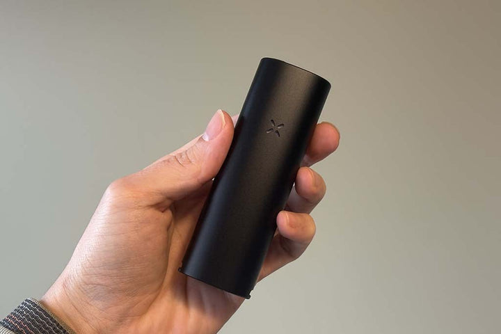 PAX 4 vaporizador portátil en mano — 125 gramos ultraligero
